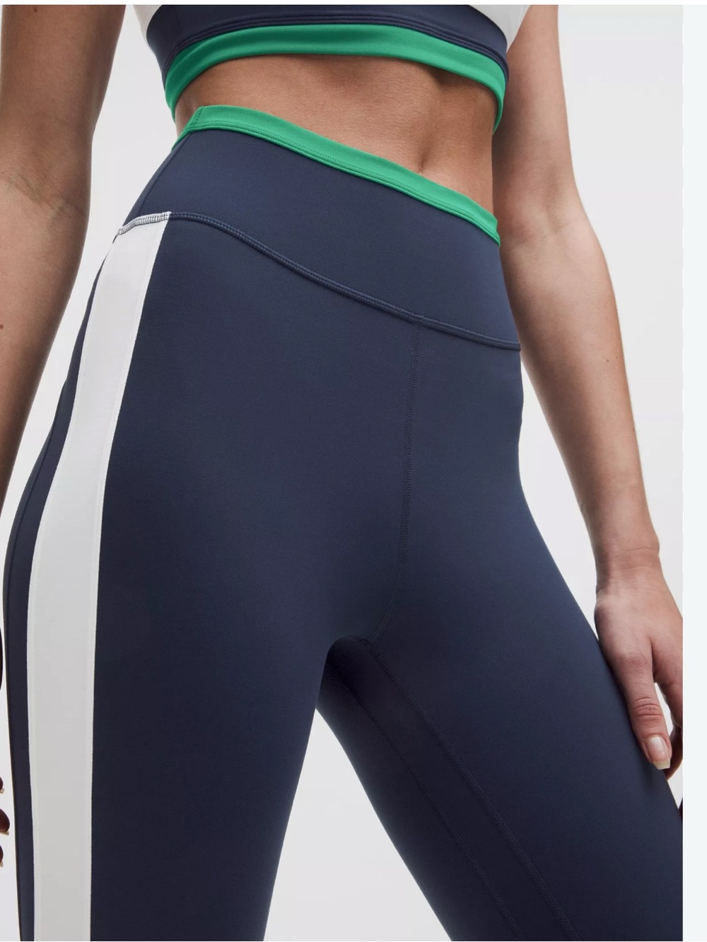 lululemon athletica Navy Leggings with White Side Stripe and Green Waist Trim